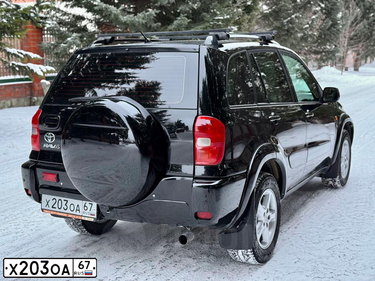 Фото автомобиля TOYOTA RAV4, 2003 — госномер Х203ОА67. Цвет: ЧЕРНЫЙ