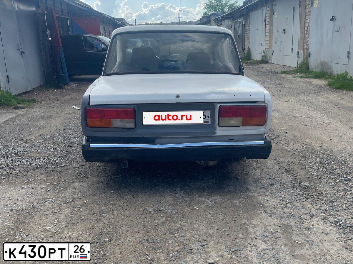 Фото автомобиля LADA 2107, 2004 — госномер К430РТ26. Цвет: ЯРКО-БЕЛЫЙ