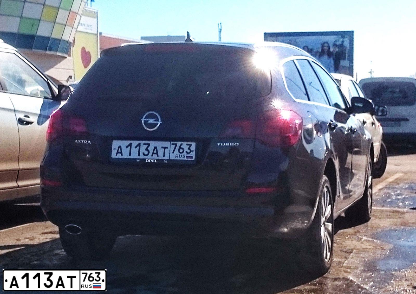 Фото автомобиля OPEL ASTRA, 2012 — госномер А793ТУ197. Цвет: Коричневый