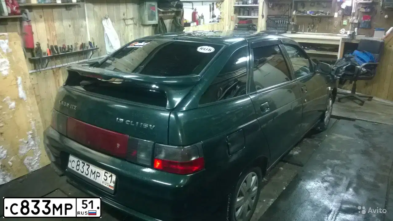Фото автомобиля LADA 2112, 2004 — госномер С833МР51. Цвет: ТЕМНО-ЗЕЛЕНЫЙ