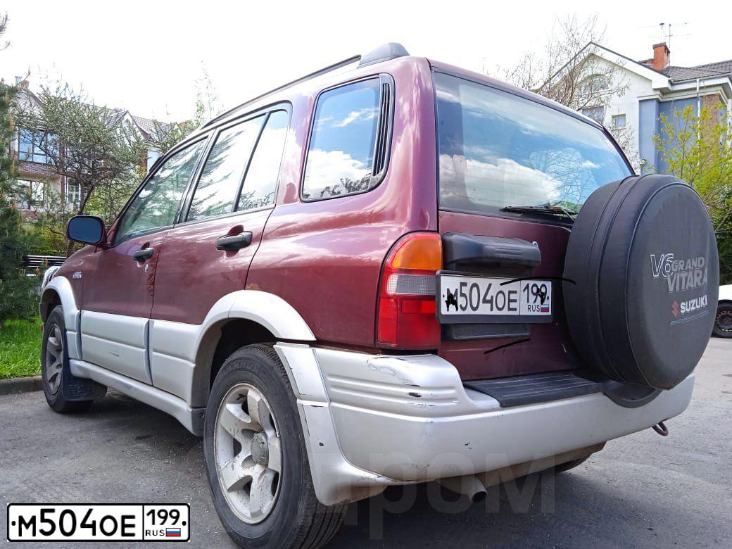 Фото автомобиля SUZUKI /GRAND/ VITARA, 2000 — госномер М504ОЕ199. Цвет: ВИШНЕВЫЙ