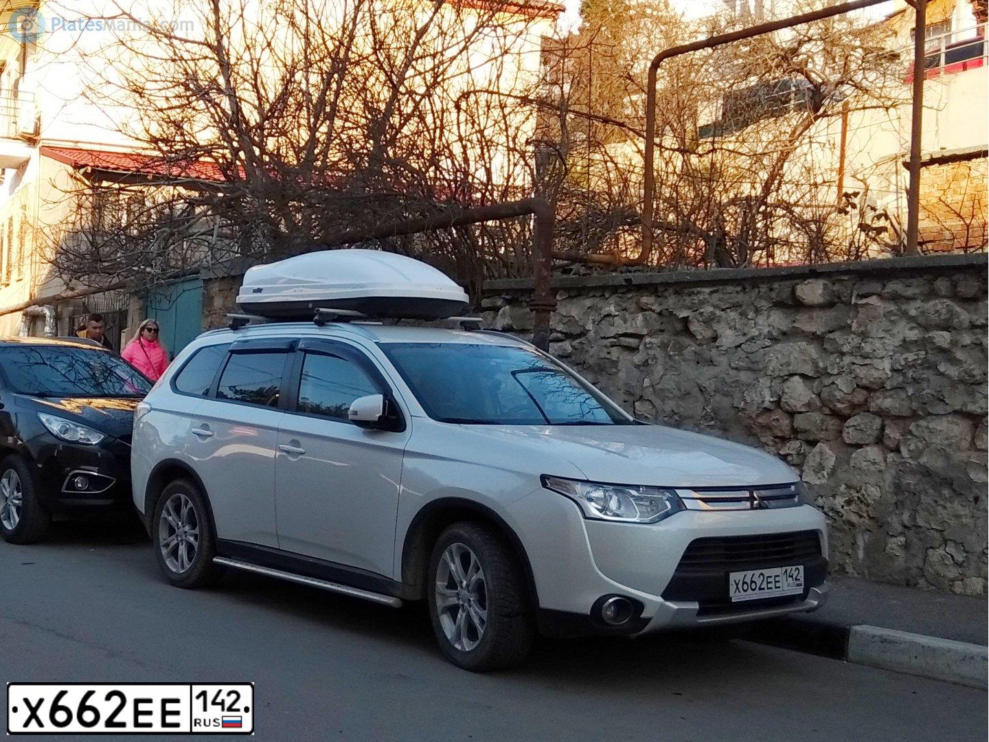 Фото автомобиля MITSUBISHI OUTLANDER, 2014 — госномер К615ВК82. Цвет: Белый