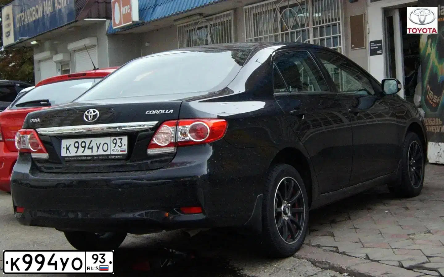 Фото автомобиля TOYOTA COROLLA, 2010 — госномер К994УО93. Цвет: ЧЕРНЫЙ
