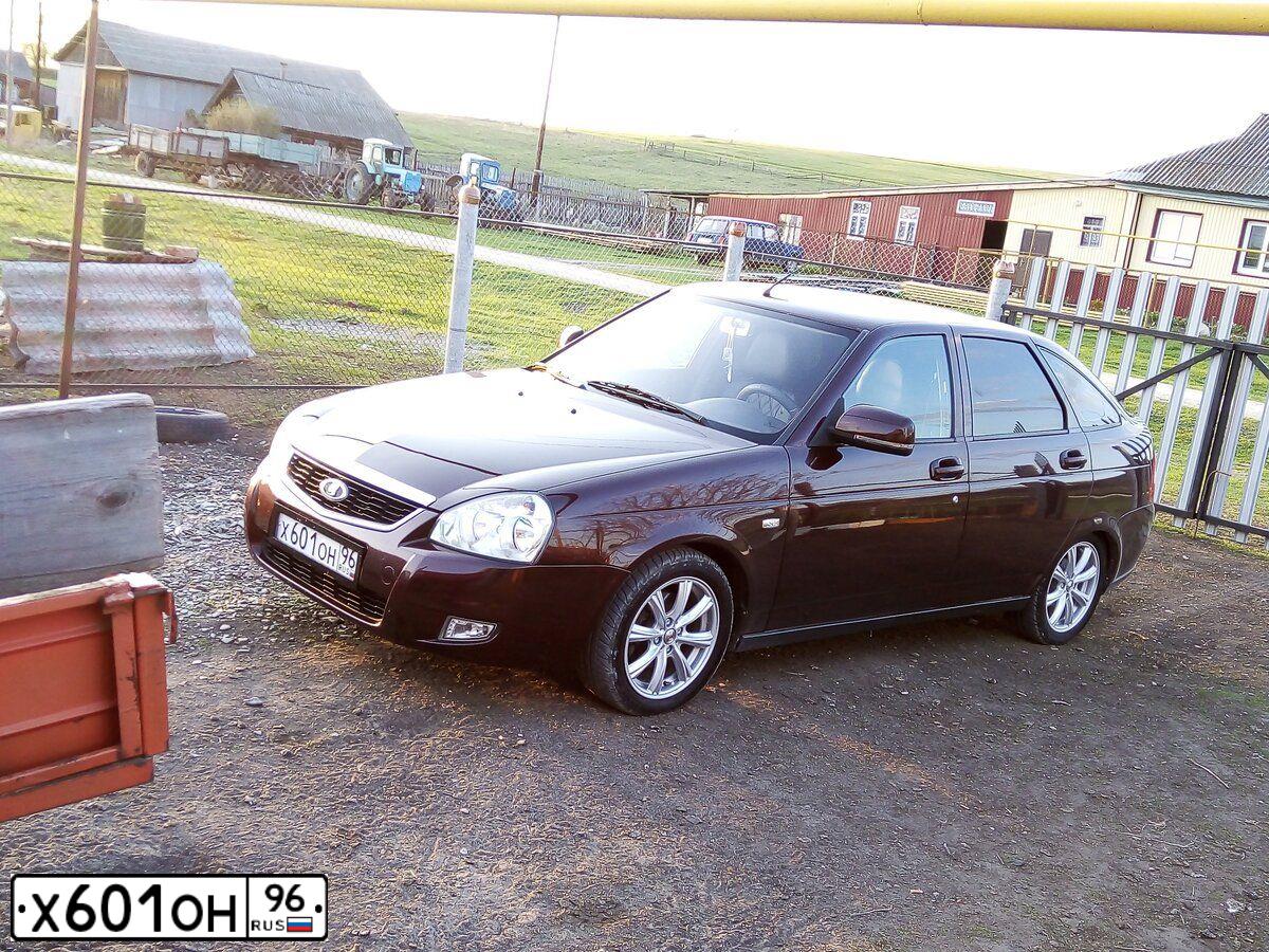Фото автомобиля LADA 2172 PRIORA, 2012 — госномер М055КК13. Цвет: ТЕМНО-ВИШНЕВЫЙ