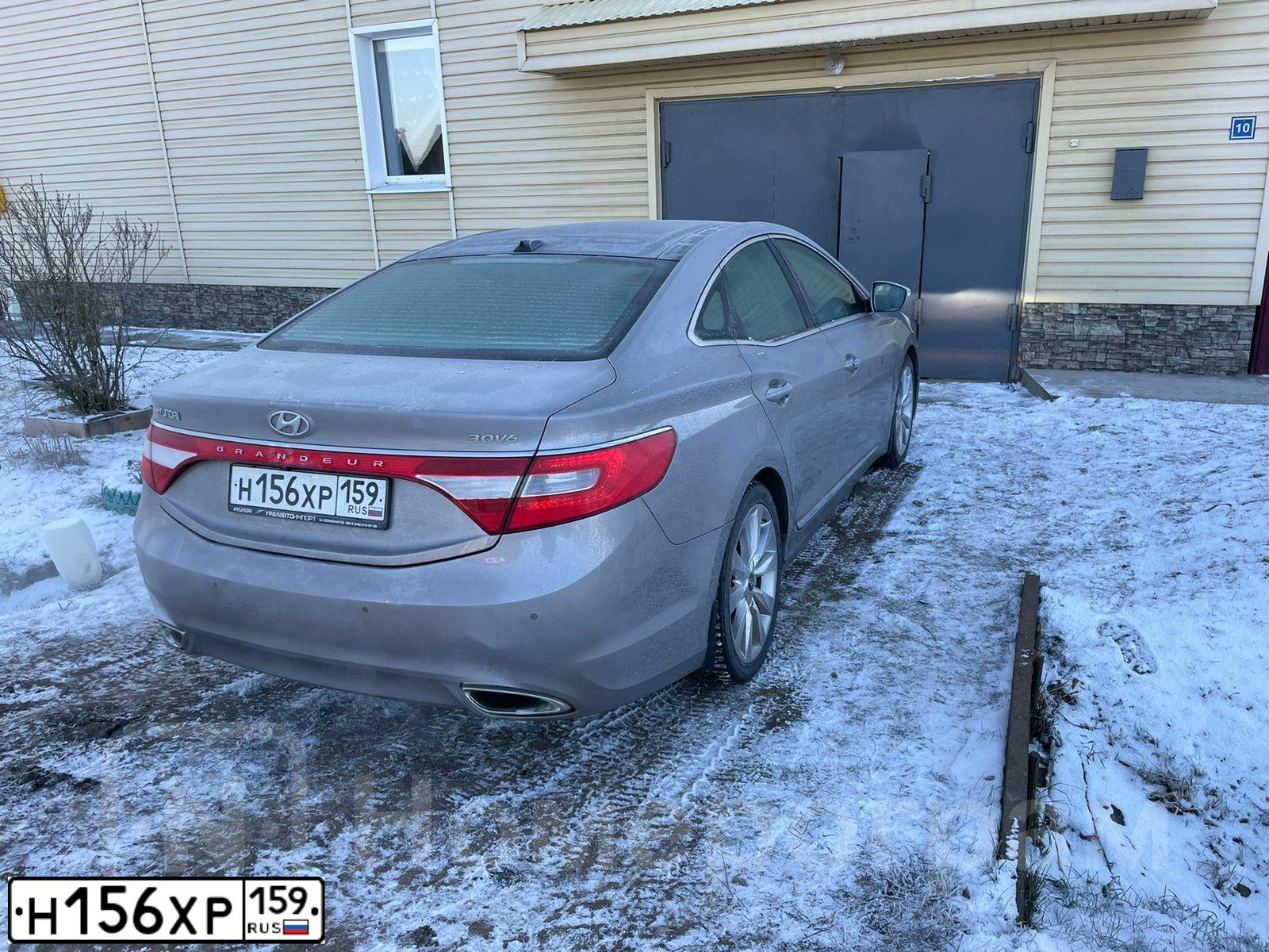 Фото автомобиля HYUNDAI GRANDEUR, 2012 — госномер Н156ХР159. Цвет: СЕРЫЙ-ЧЕРНЫЙ