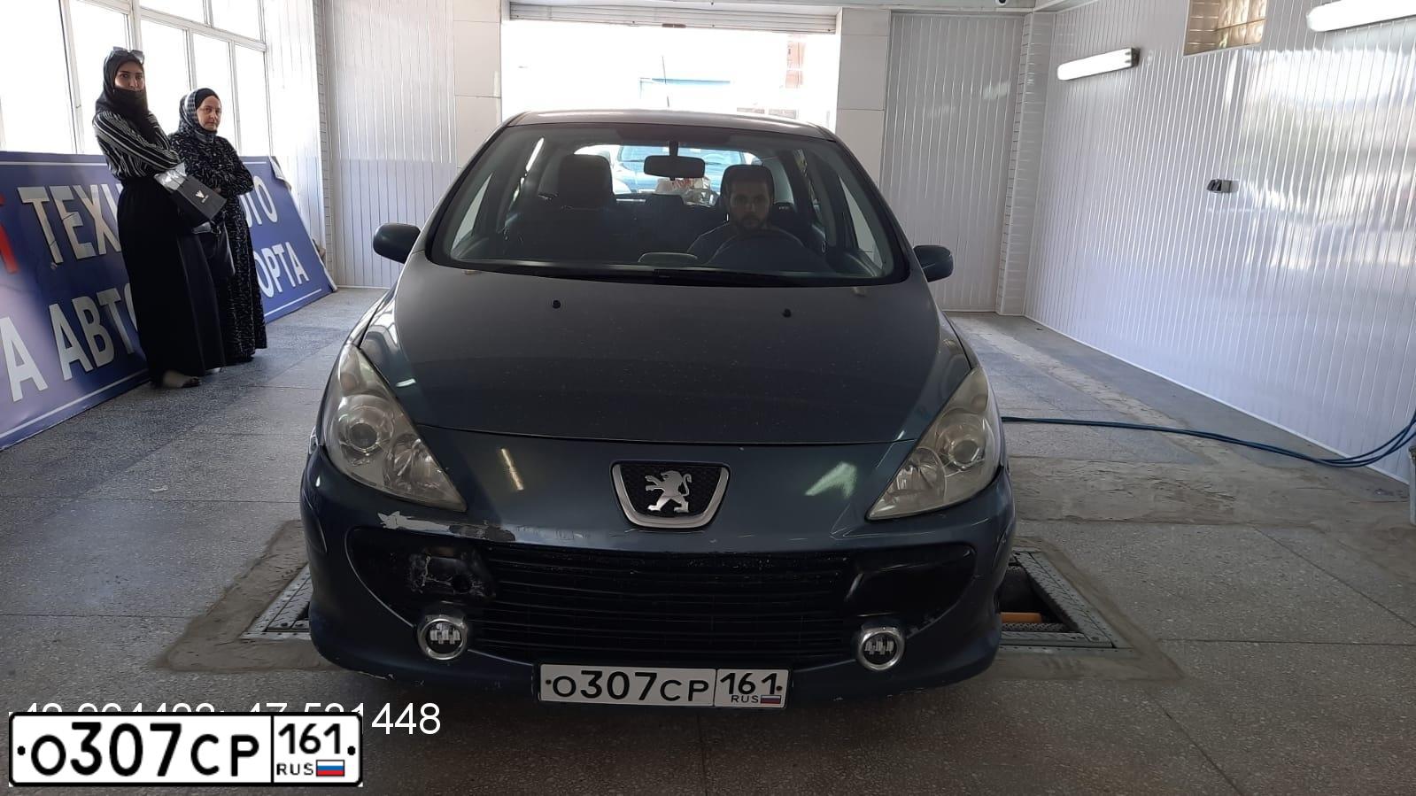 Фото автомобиля PEUGEOT 307, 2006 — госномер Т438ХЕ05. Цвет: Серый