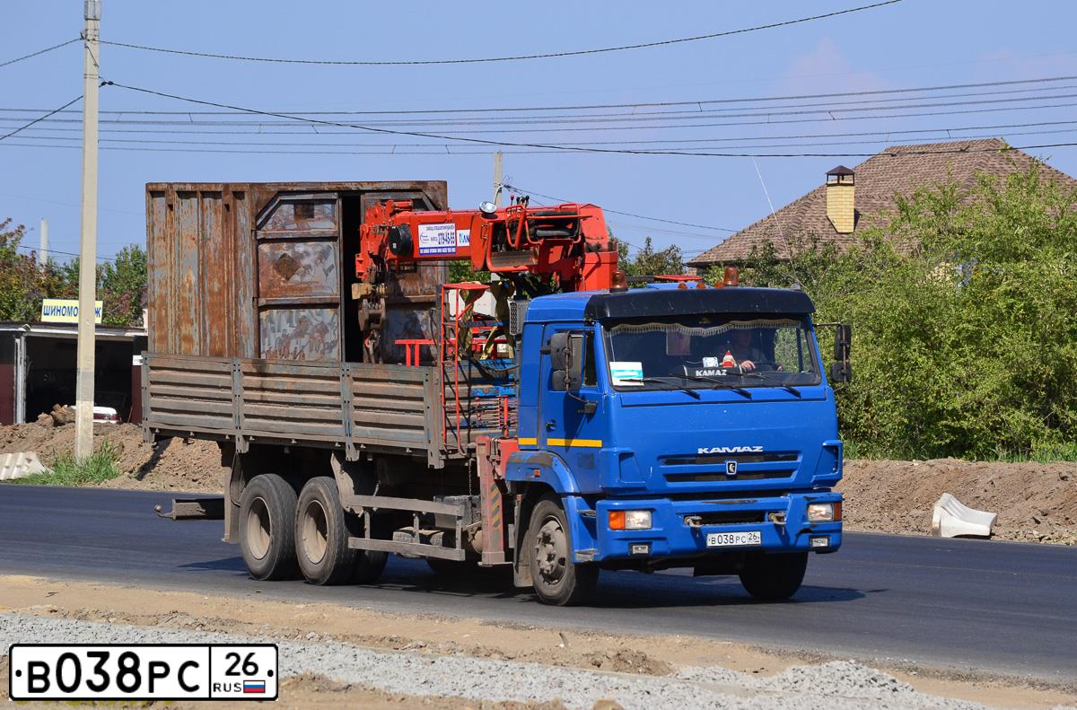 Фото автомобиля KAMAZ 65117 /6X4/, 2013 — госномер В038РС26. Цвет: синий