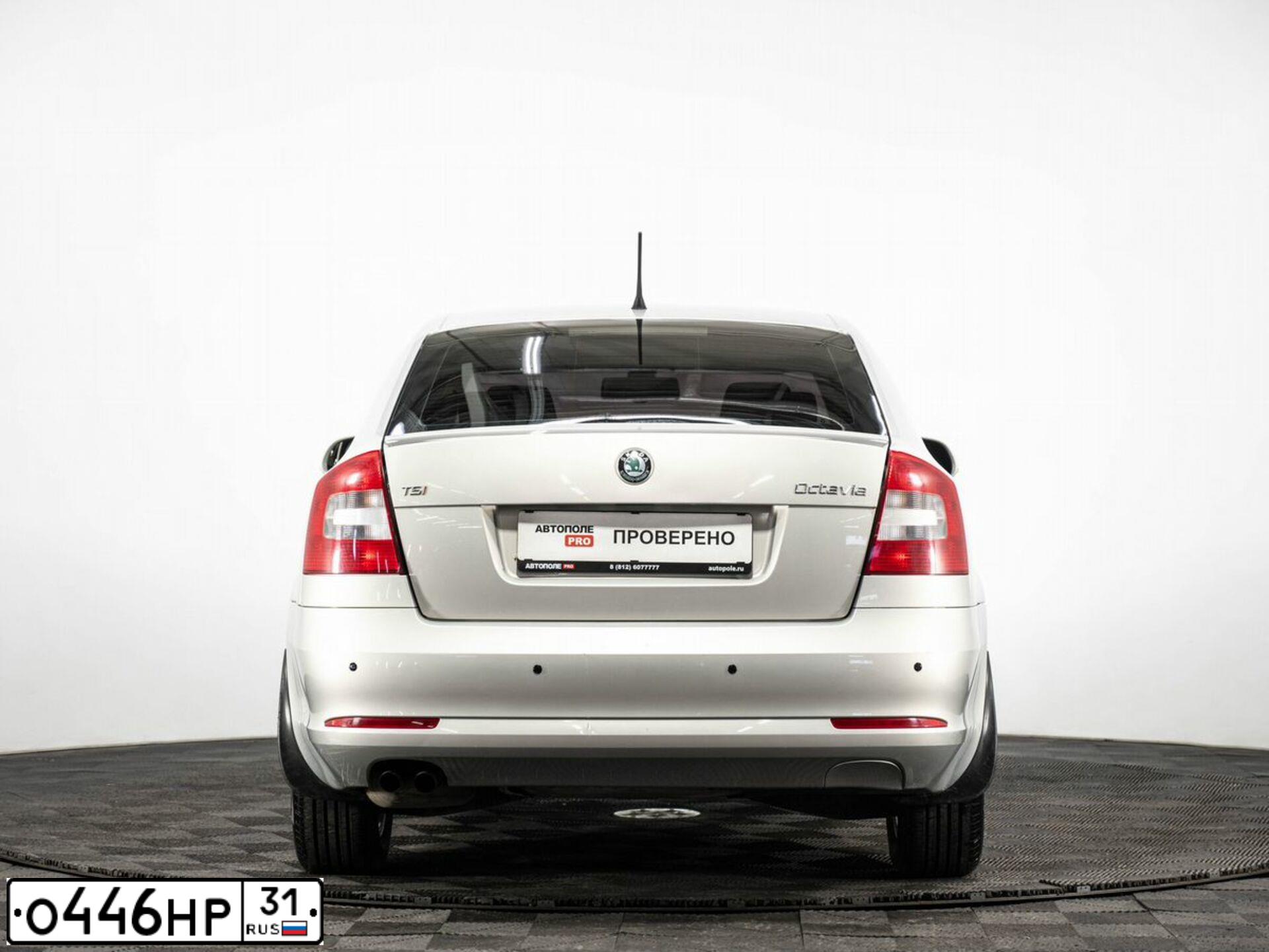 Фото автомобиля SKODA OCTAVIA, 2012 — госномер Е493КА147. Цвет: Серебристо-Желтый