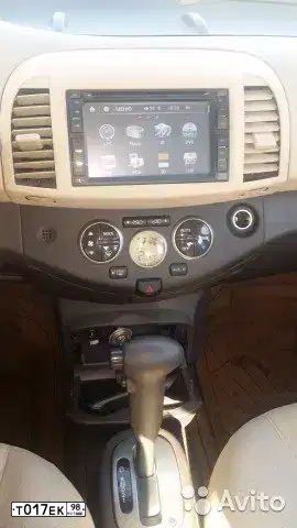 Фото автомобиля NISSAN MICRA, 2008 — госномер Т017ЕК98. Цвет: ВИШНЕВЫЙ