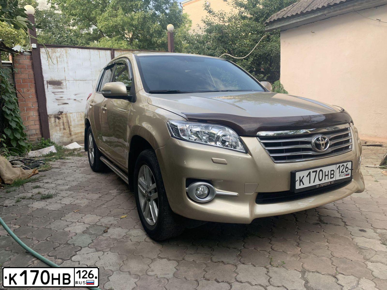 Фото автомобиля TOYOTA RAV4, 2012 — госномер К414НН33. Цвет: БЕЖЕВЫЙ