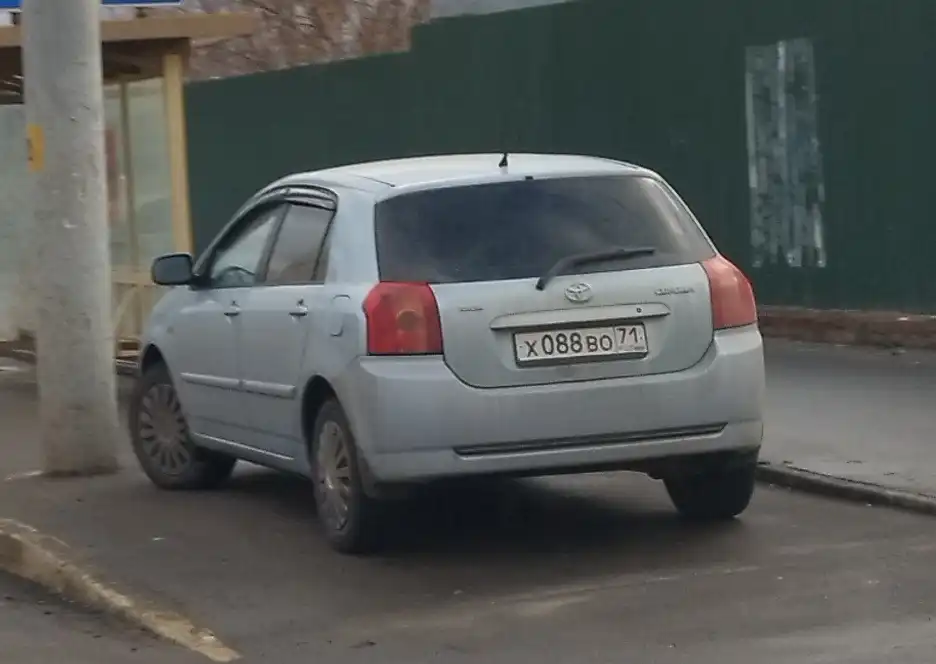 Фото автомобиля TOYOTA COROLLA, 2004 — госномер Х088ВО71. Цвет: СВЕТЛО-ГОЛУБОЙ