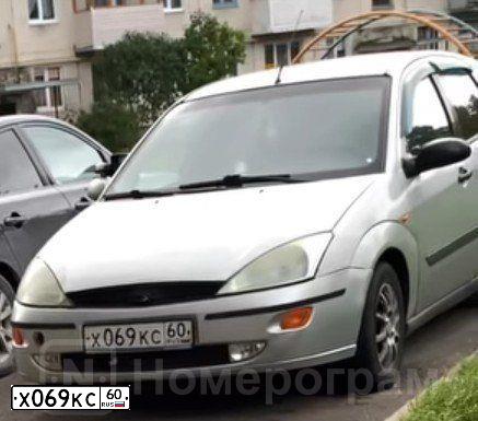 Фото автомобиля FORD FOCUS, 2000 — госномер Х069КС60. Цвет: серебристый
