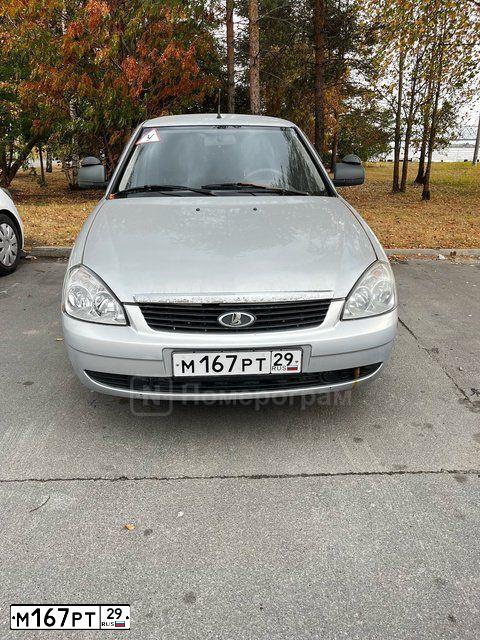 Фото автомобиля LADA 2170 PRIORA, 2012 — госномер М167РТ29. Цвет: СВЕТЛО-СЕРЫЙ