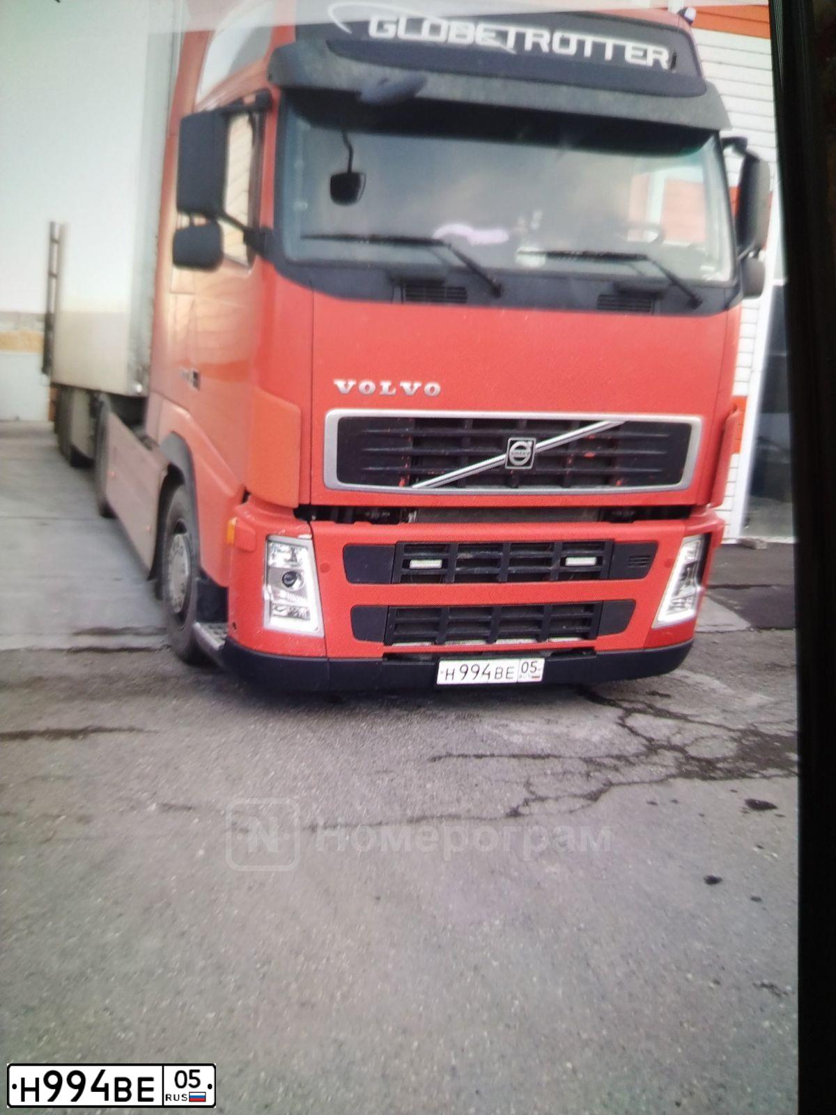 Фото автомобиля VOLVO SERIE FH /4X2/, 2003 — госномер Н994ВЕ05. Цвет: Оранжевый