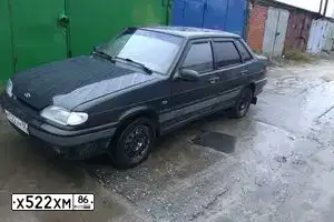 Фото автомобиля LADA 2115 SAMARA, 2006 — госномер Х522ХМ86. Цвет: ЗОЛОТИСТО-ТЕМНО-ЗЕЛЕНЫЙ