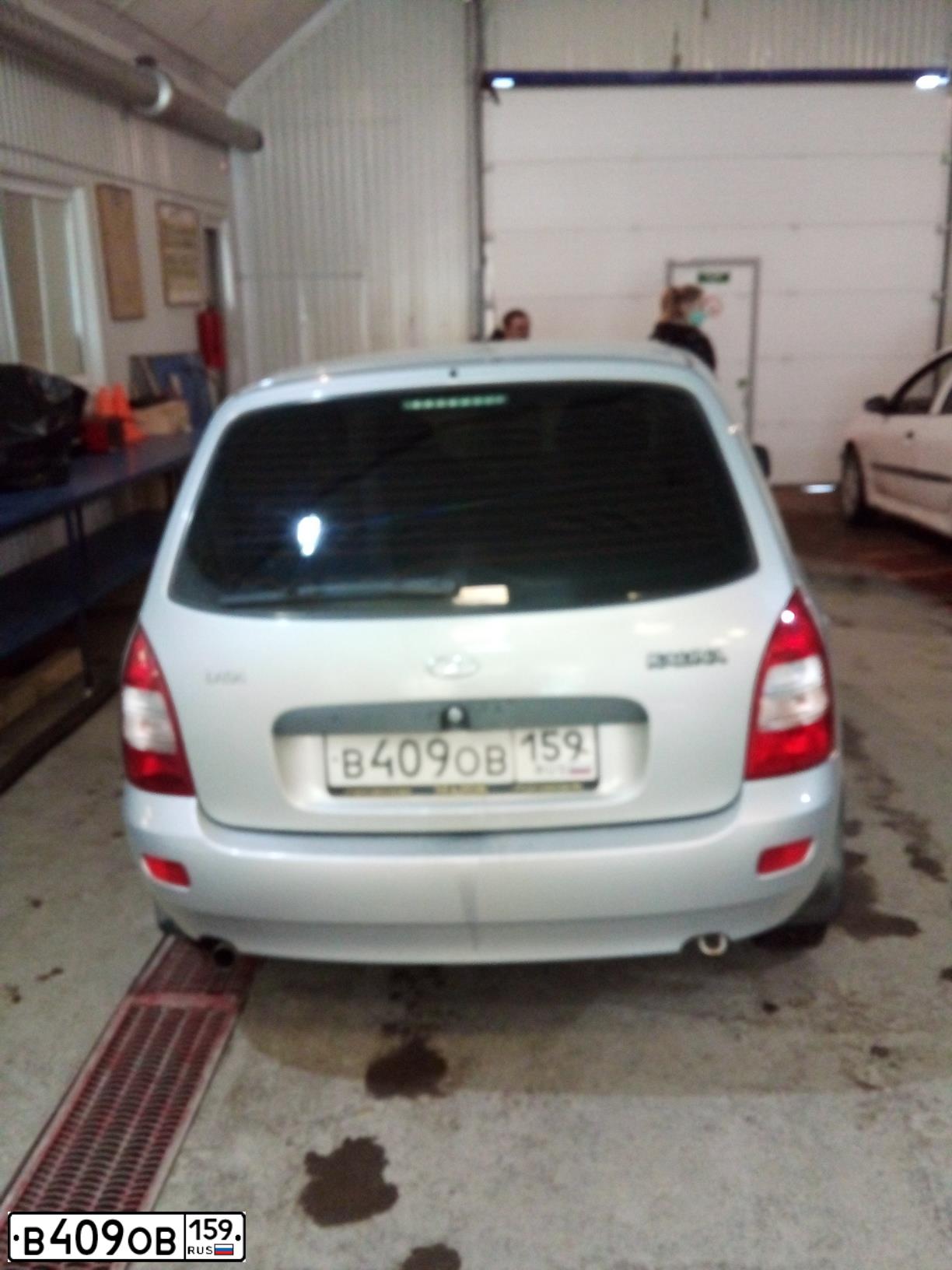 Фото автомобиля LADA 1117 KALINA, 2012 — госномер Е052ХМ702. Цвет: СЕРЕБРИСТЫ