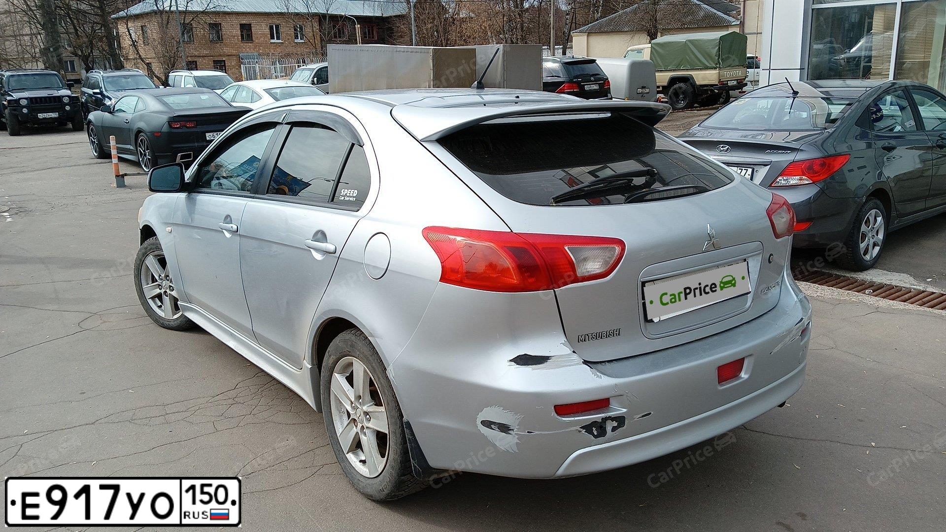 Фото автомобиля MITSUBISHI LANCER, 2008 — госномер В448КХ122. Цвет: Серебристый