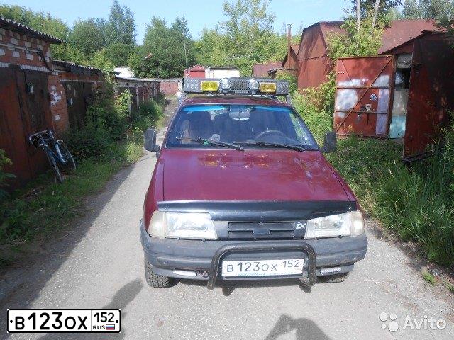 Фото автомобиля IZH 2126, 2003 — госномер В123ОХ152. Цвет: КРАСНЫЙ