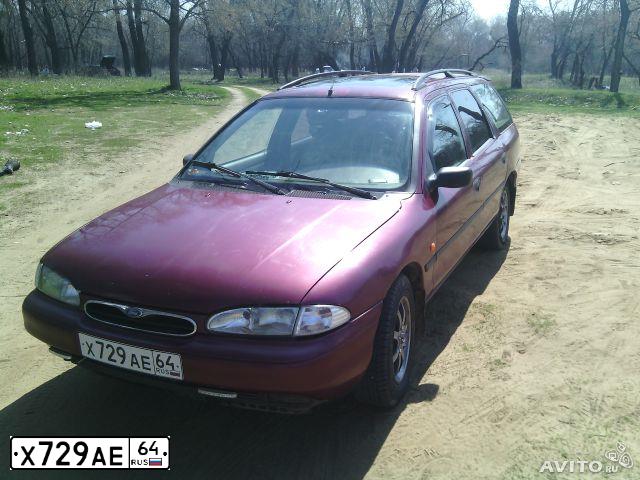 Фото автомобиля FORD MONDEO, 1994 — госномер Х729АЕ64. Цвет: ТЕМНО КРАСНЫЙ