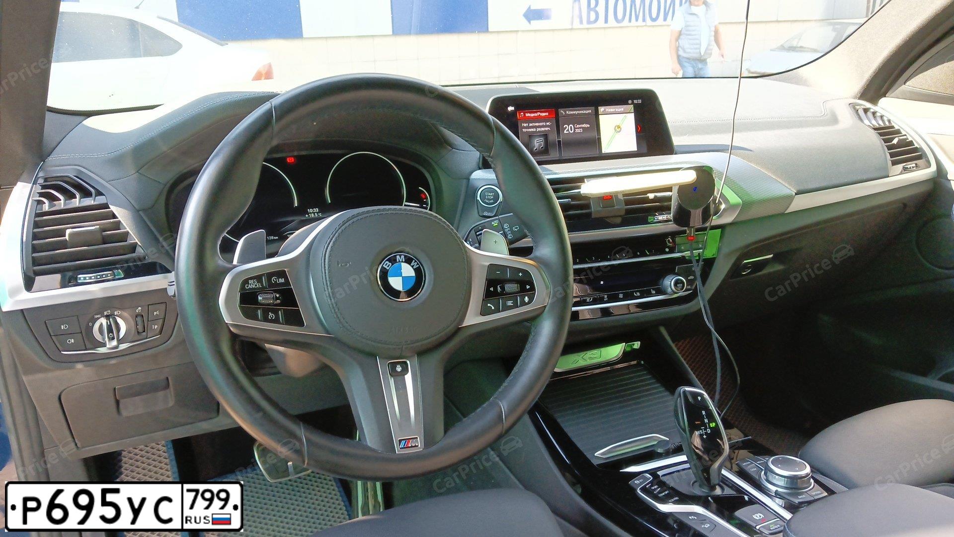 Фото автомобиля BMW X3, 2021 — госномер Е883УО797. Цвет: синий