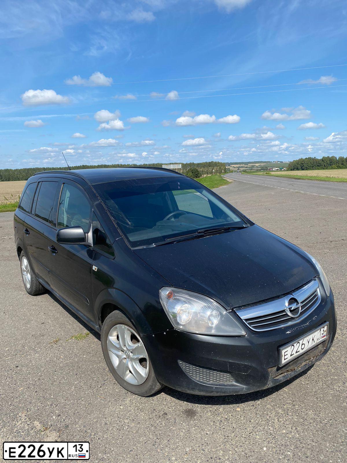 Фото автомобиля OPEL ZAFIRA, 2012 — госномер Е226УК13. Цвет: ЧЕРНЫЙ