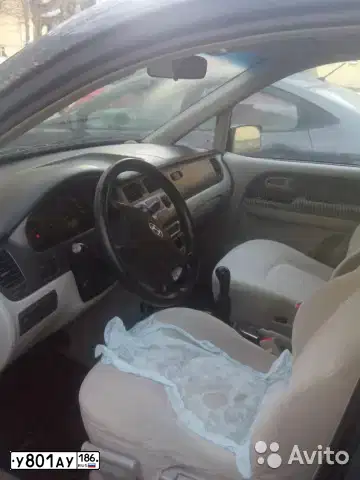 Фото автомобиля HYUNDAI TRAJET, 2005 — госномер У478ХС72. Цвет: ТЕМНО-СЕРЫЙ