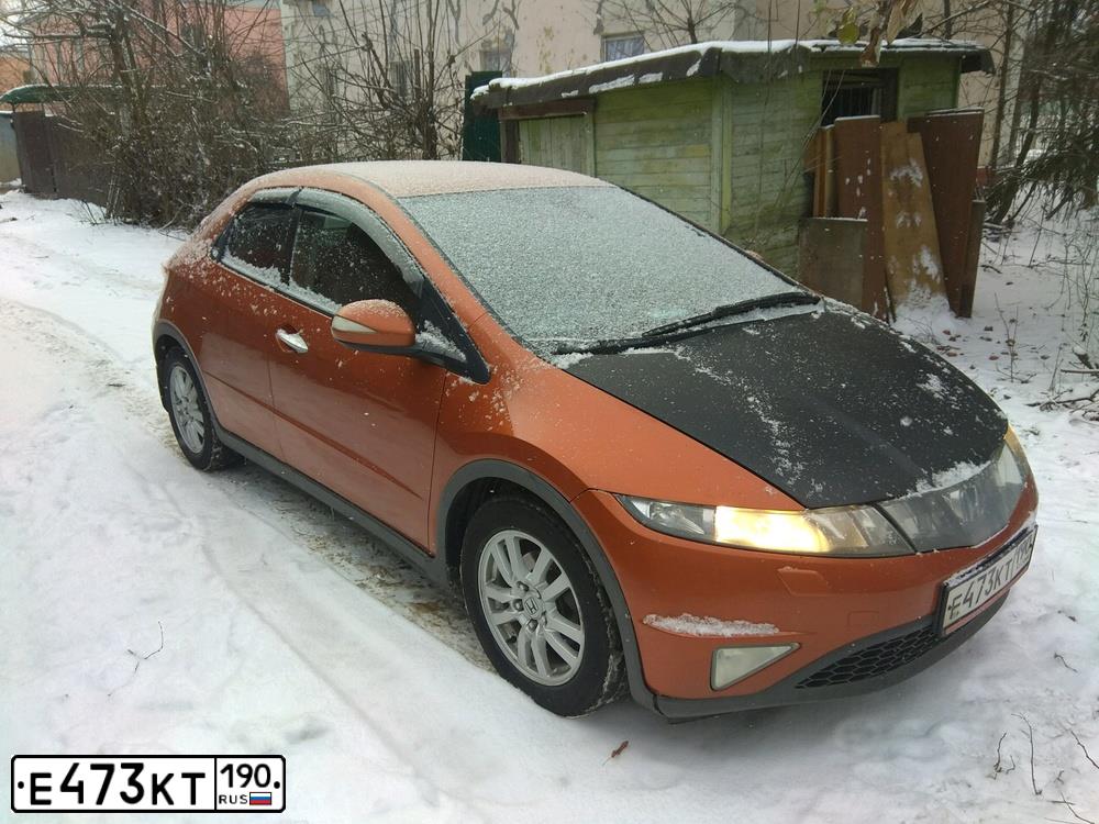 Фото автомобиля HONDA CIVIC, 2008 — госномер Е473КТ190. Цвет: ОРАНЖЕВЫЙ