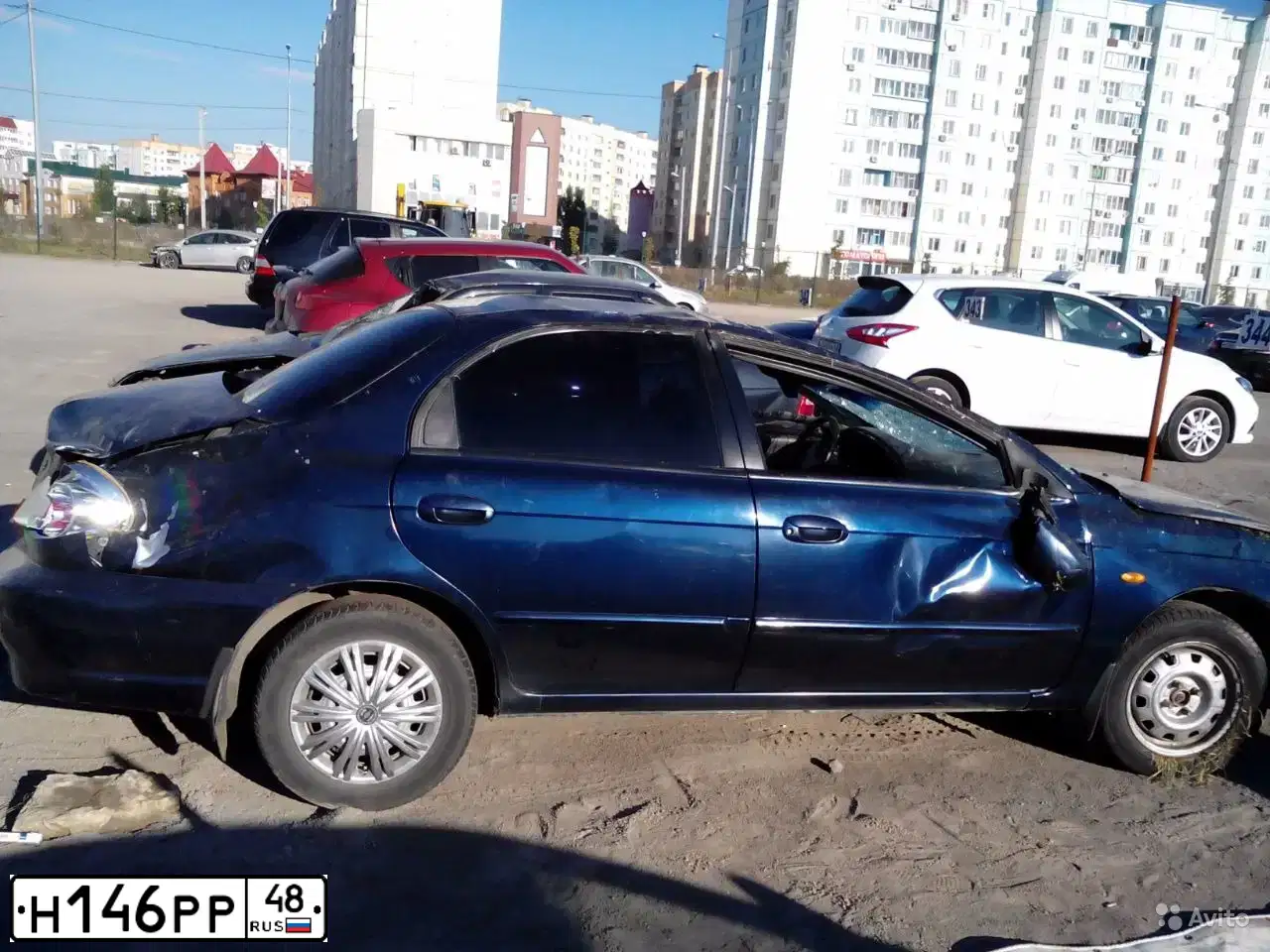 Фото автомобиля KIA SPECTRA, 2007 — госномер Н146РР48. Цвет: ТЕМНО-СИНИЙ