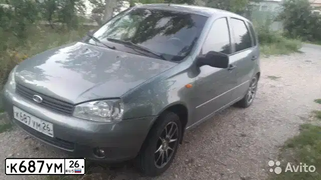 Фото автомобиля LADA 1119 KALINA, 2011 — госномер К687УМ26. Цвет: Темно-серый металлик