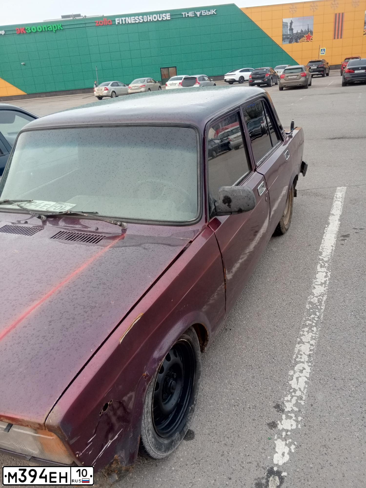 Фото автомобиля LADA 2107, 2005 — госномер М394ЕН10. Цвет: ТЕМНО-ВИШНЕВЫЙ