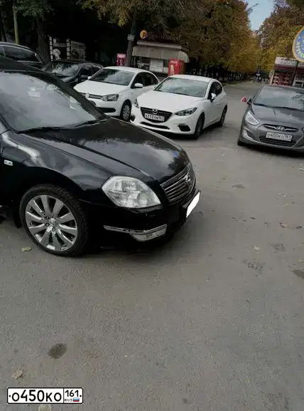 Фото автомобиля HYUNDAI SOLARIS, 2013 — госномер О450КО161. Цвет: ЧЕРНО-СЕРЫЙ