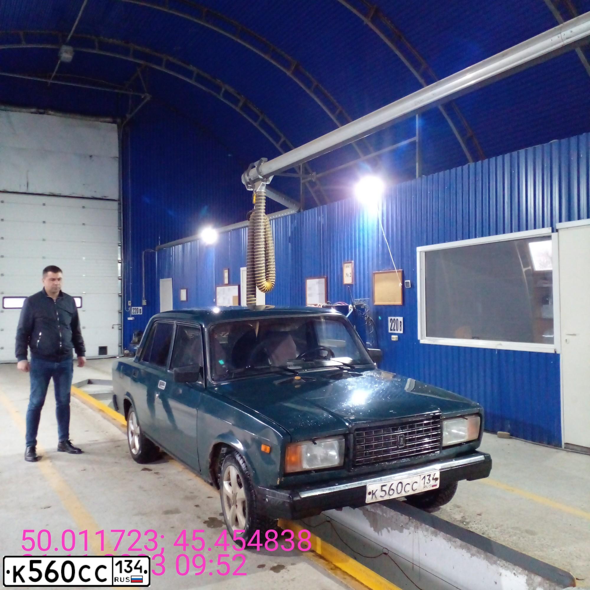 Фото автомобиля LADA 2107, 2007 — госномер Е003НУ134. Цвет: ТЕМНО ЗЕЛЕНЫЙ