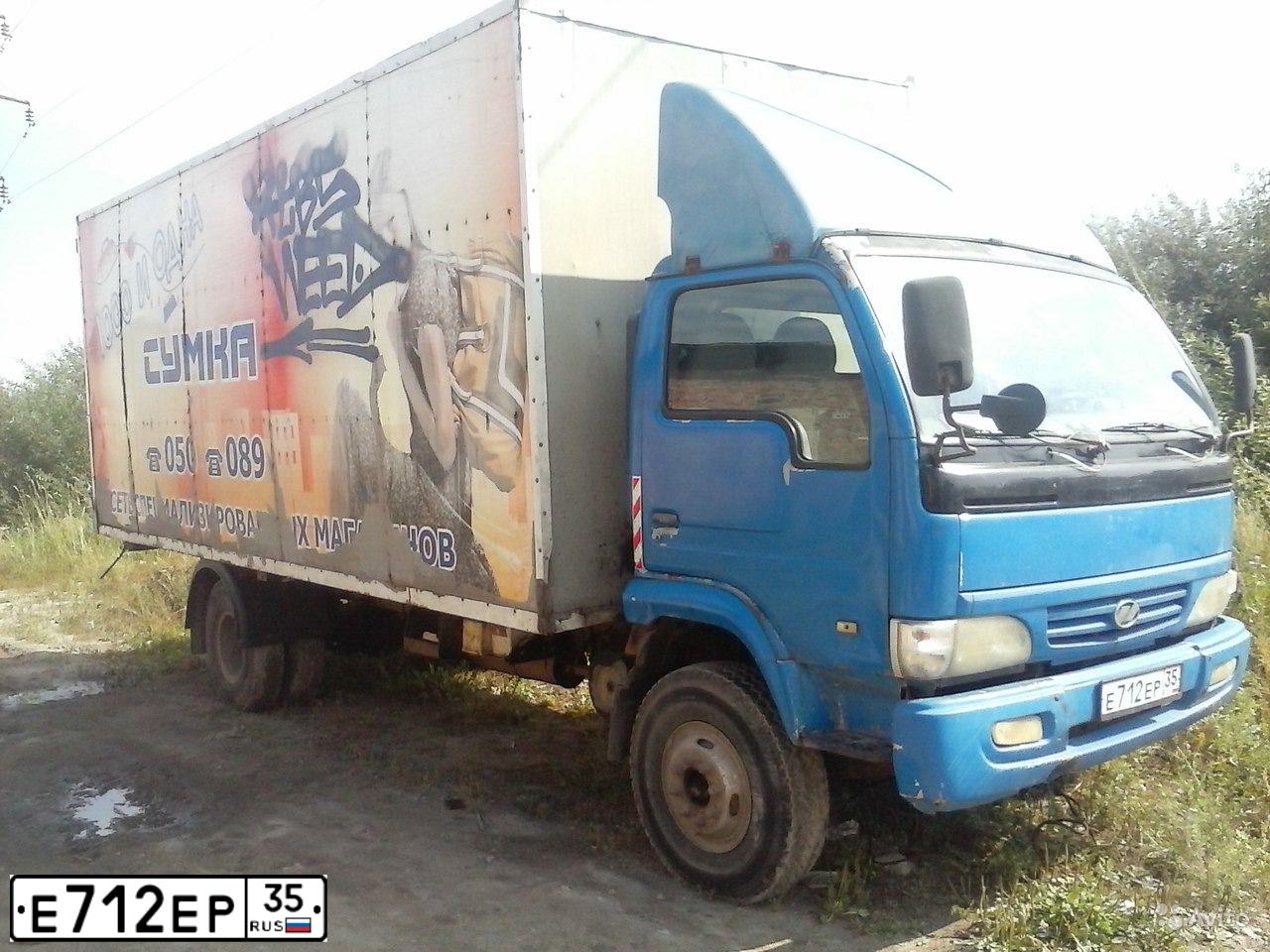 Фото автомобиля YUEJIN NJ 1080, 2007 — госномер У231ОО47. Цвет: СИНИЙ
