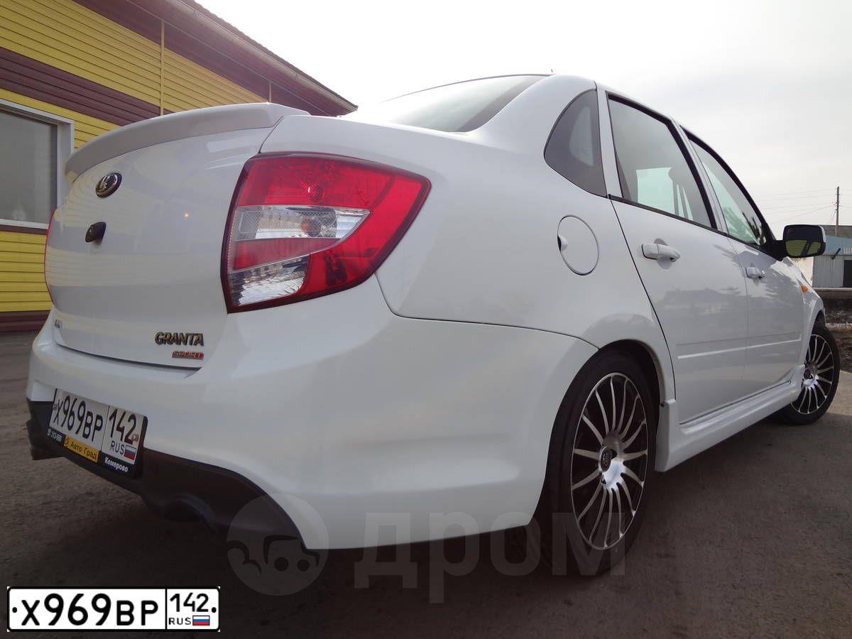 Фото автомобиля LADA 2190 GRANTA, 2013 — госномер Р418ОК124. Цвет: Белый