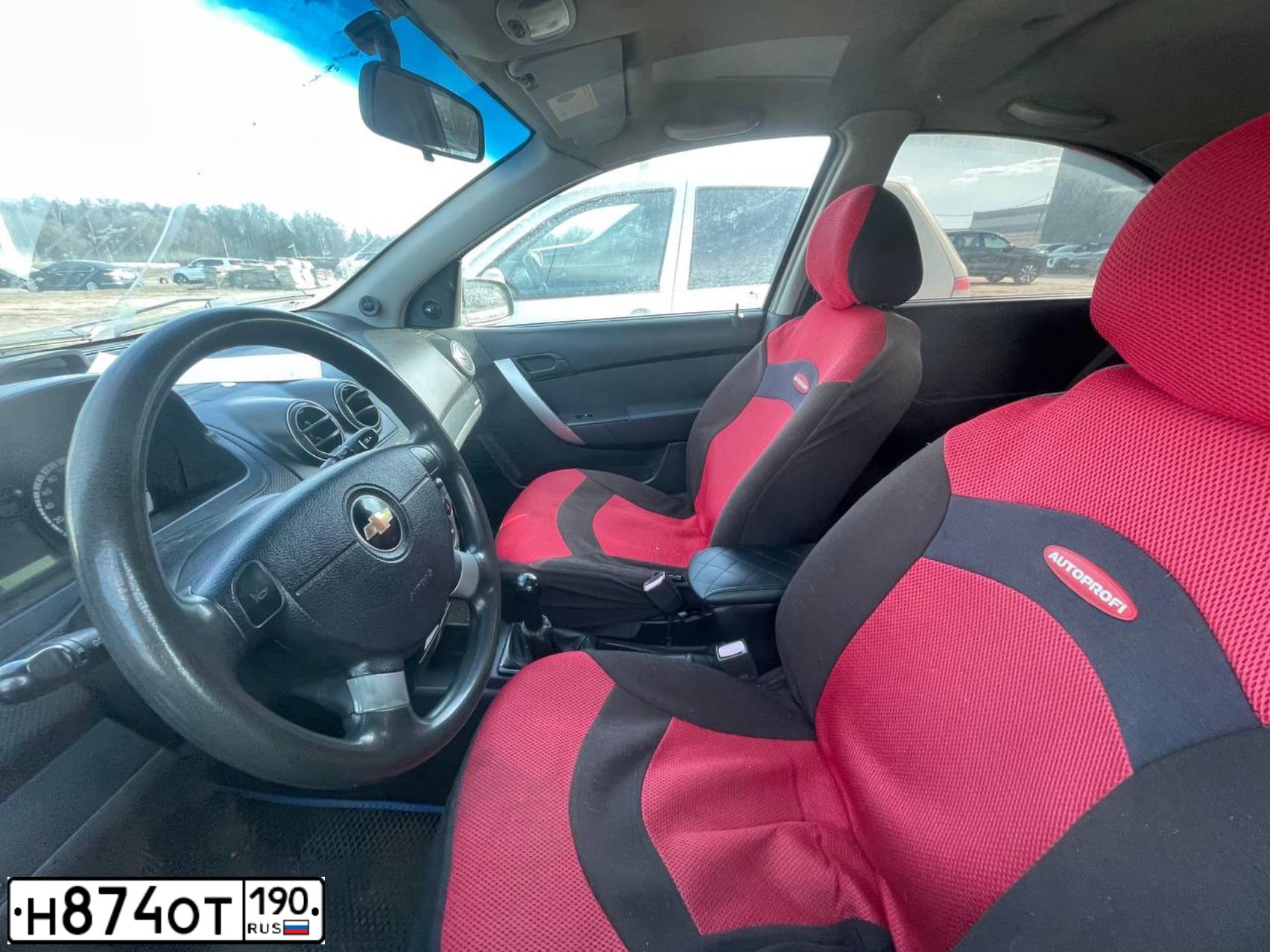 Фото автомобиля CHEVROLET AVEO, 2008 — госномер Н874ОТ190. Цвет: СЕРЫЙ