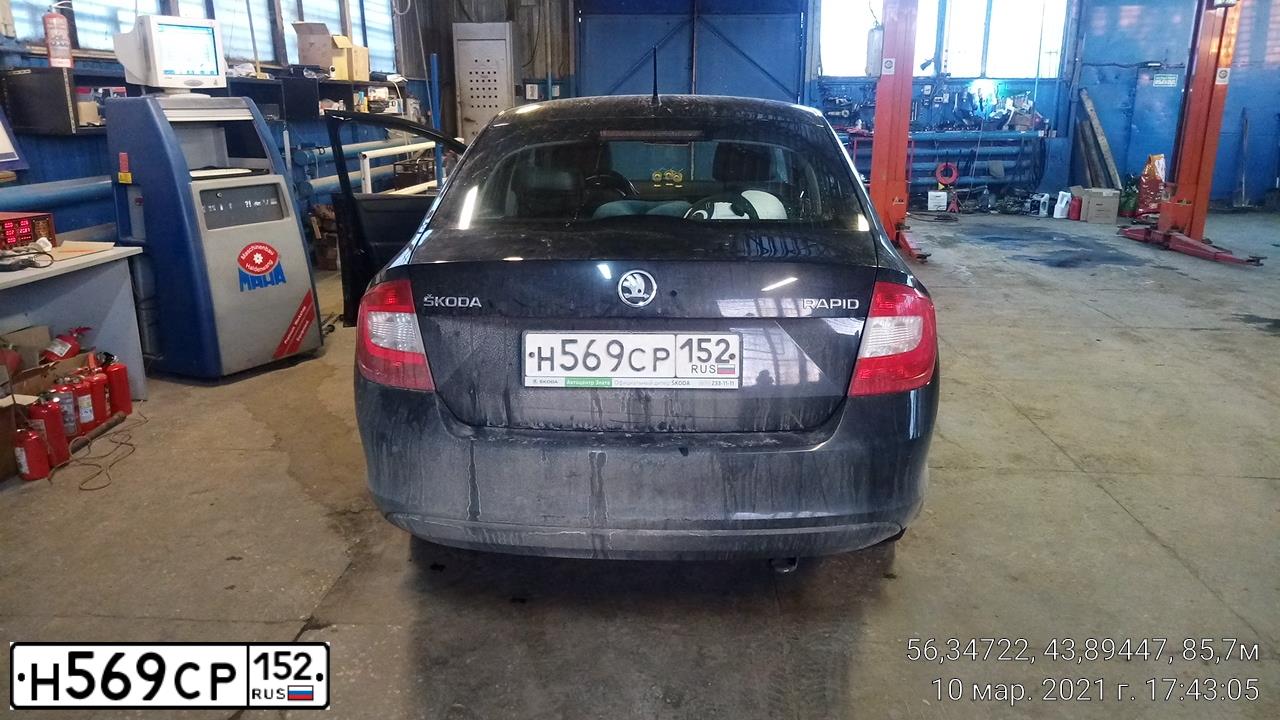 Фото автомобиля SKODA RAPID, 2014 — госномер Н569СР152. Цвет: ЧЕРНЫЙ