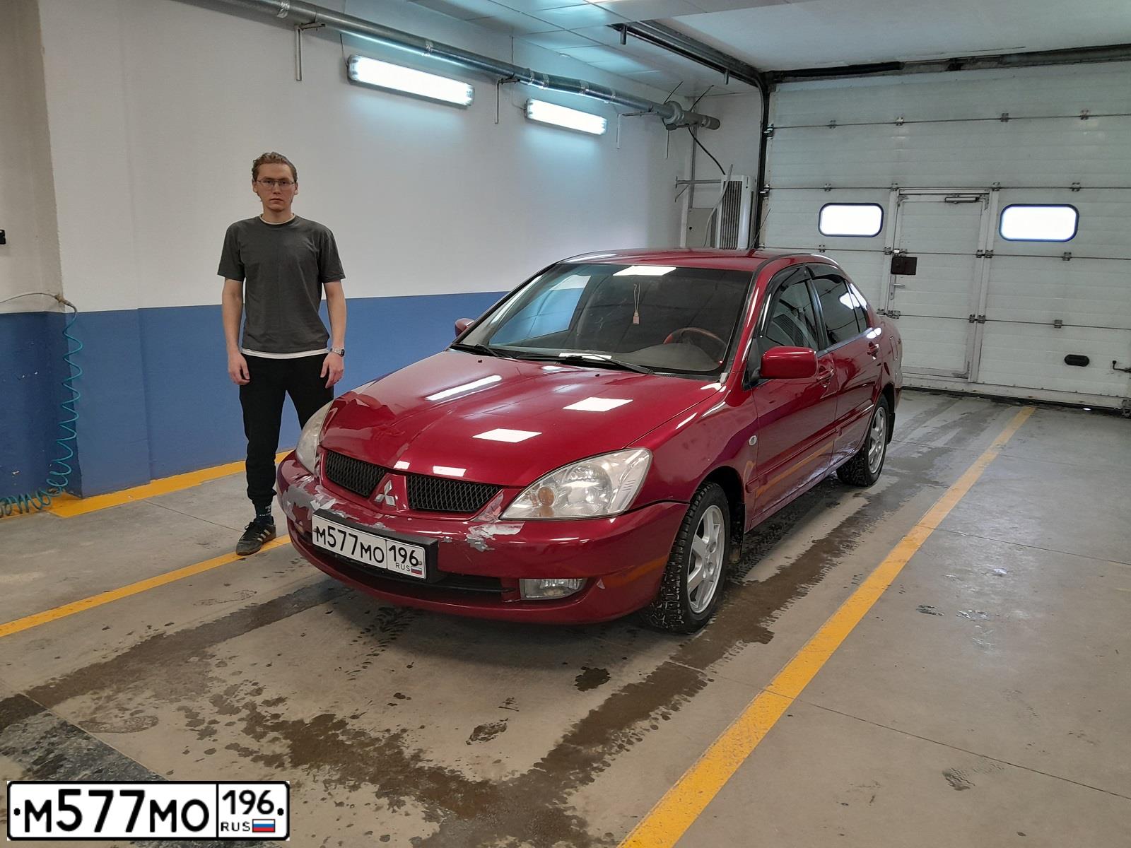 Фото автомобиля MITSUBISHI LANCER, 2005 — госномер М577МО196. Цвет: Красный