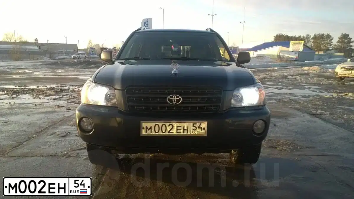 Фото автомобиля TOYOTA HIGHLANDER, 2003 — госномер Е849АЕ199. Цвет: ЧЕРНЫЙ