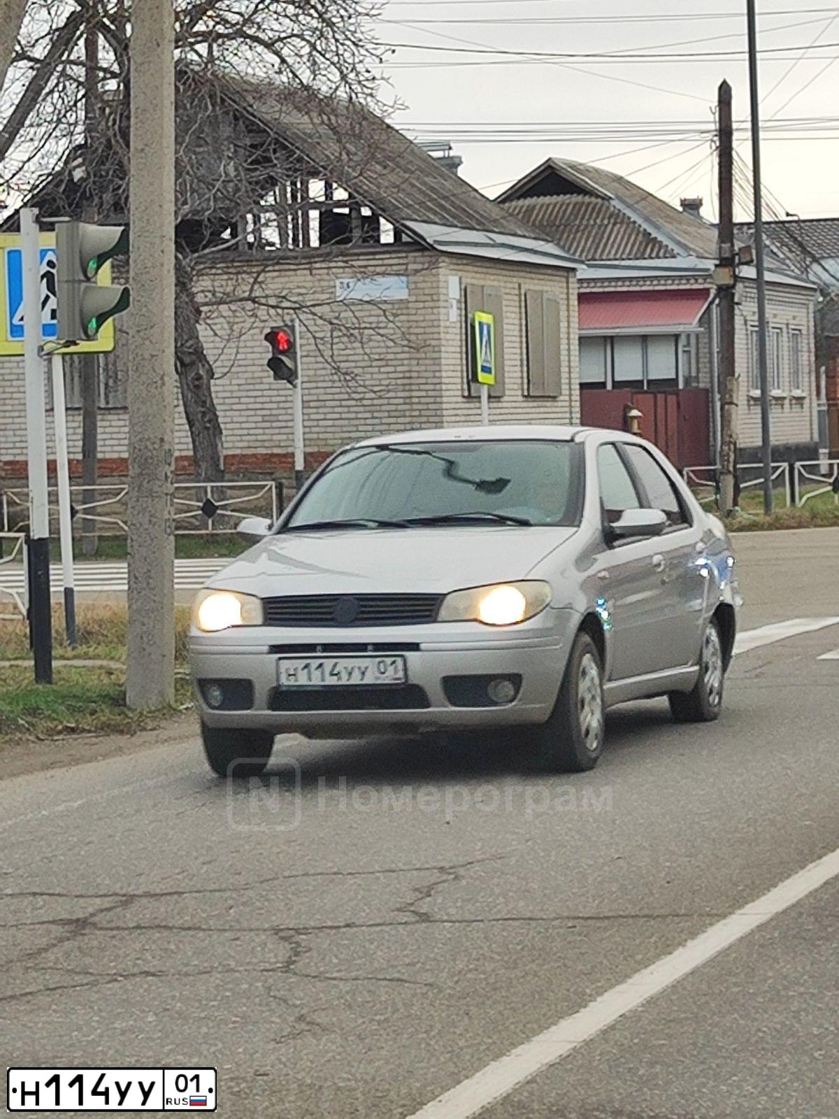 Фото автомобиля FIAT ALBEA, 2008 — госномер Н114УУ01. Цвет: СЕРЫЙ