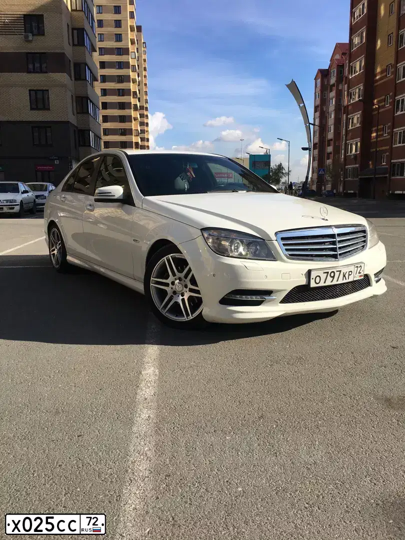 Фото автомобиля DAEWOO NEXIA, 2012 — госномер Х025СС72. Цвет: ЧЕРНЫЙ