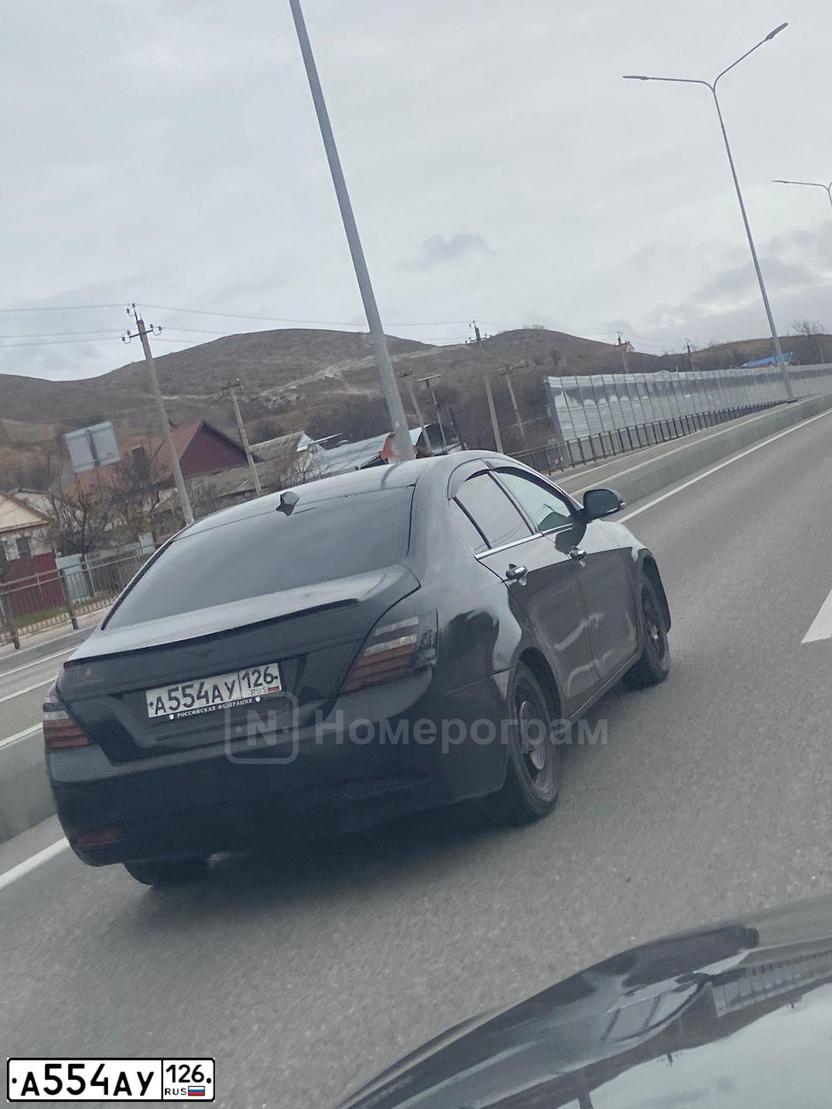 Фото автомобиля GEELY EMGRAND, 2014 — госномер А554АУ126. Цвет: ЧЕРНЫЙ