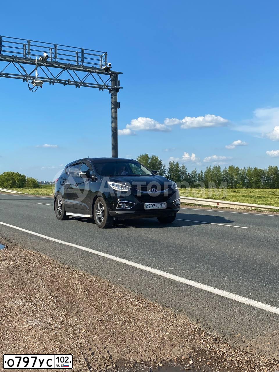Фото автомобиля LADA 2170 PRIORA, 2013 — госномер О797УС102. Цвет: Сине-Черный