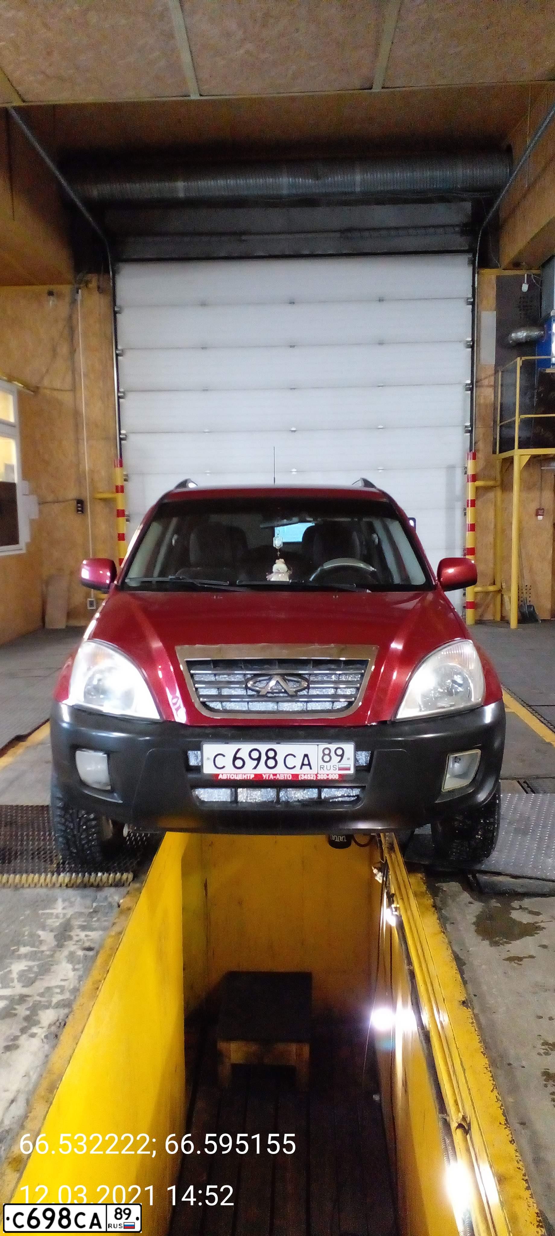 Фото автомобиля CHERY TIGGO, 2012 — госномер О369НХ72. Цвет: Красный