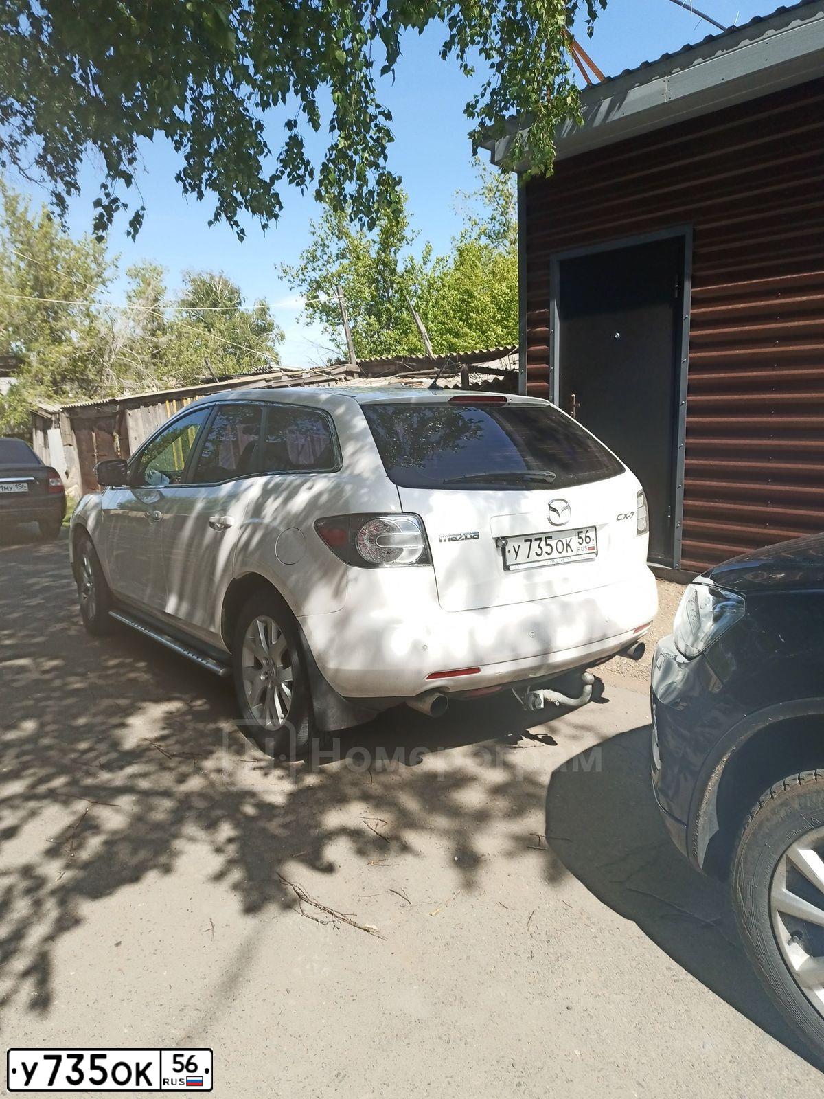 Фото автомобиля MAZDA CX-7, 2008 — госномер У735ОК56. Цвет: БЕЛЫЙ