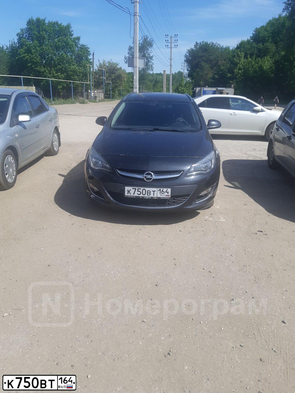 Фото автомобиля OPEL ASTRA, 2013 — госномер Т494КН64. Цвет: ЧЕРНЫЙ