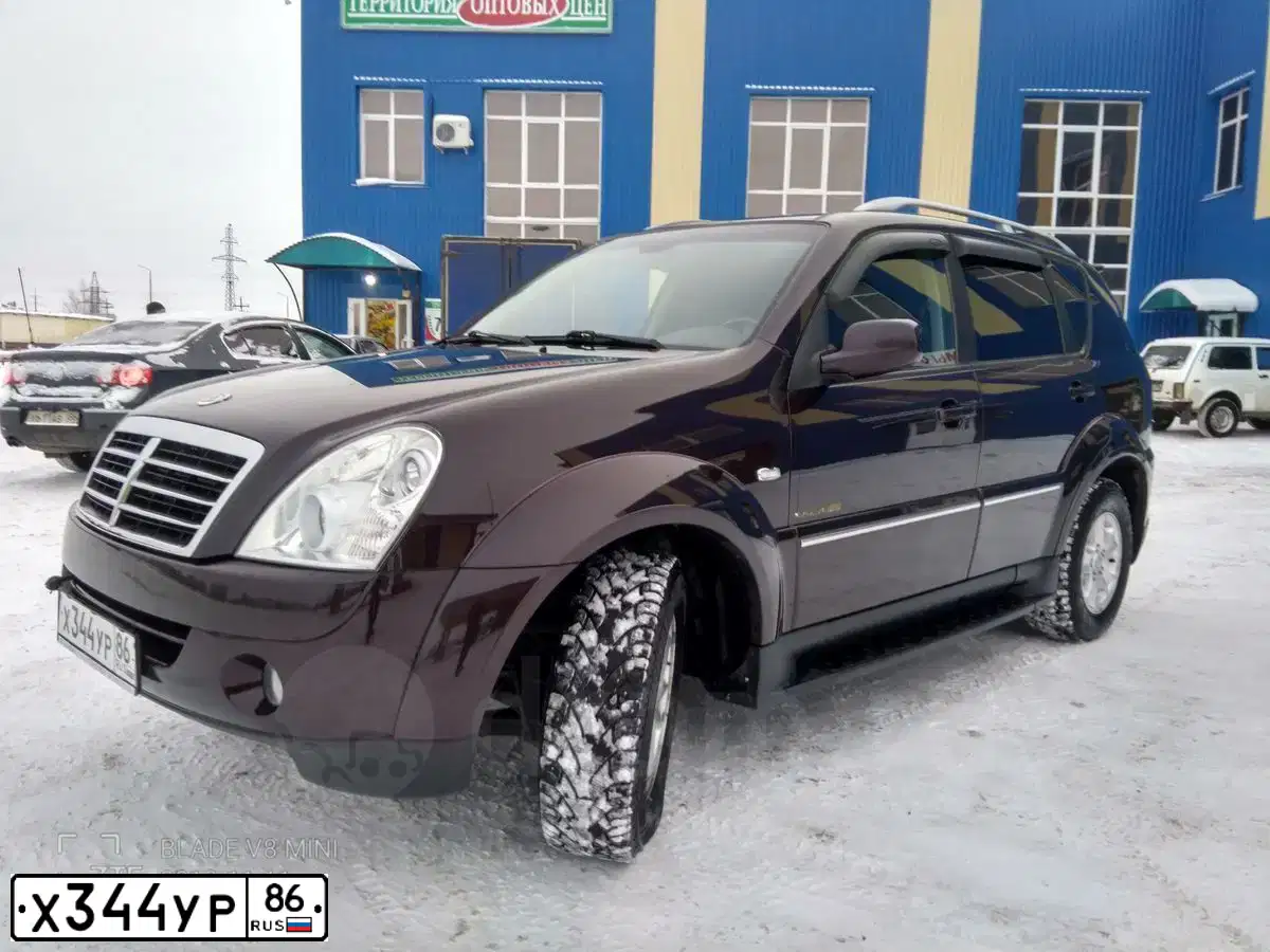 Фото автомобиля SSANGYONG REXTON, 2010 — госномер Х344УР86. Цвет: ТЕМНО-БОРДОВЫЙ