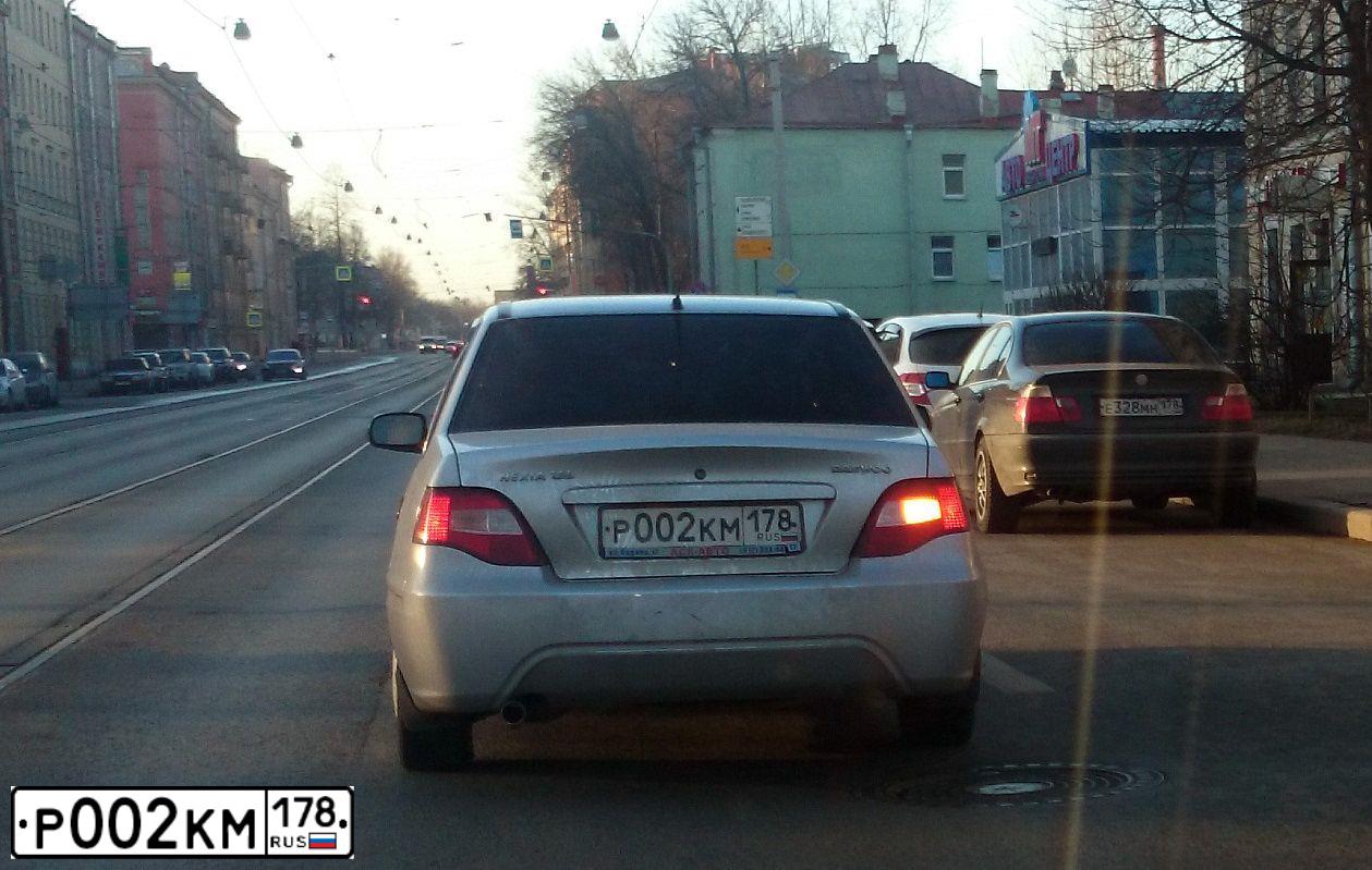 Фото автомобиля DAEWOO NEXIA, 2010 — госномер К753ММ53. Цвет: СЕРЕБРИСТЫЙ