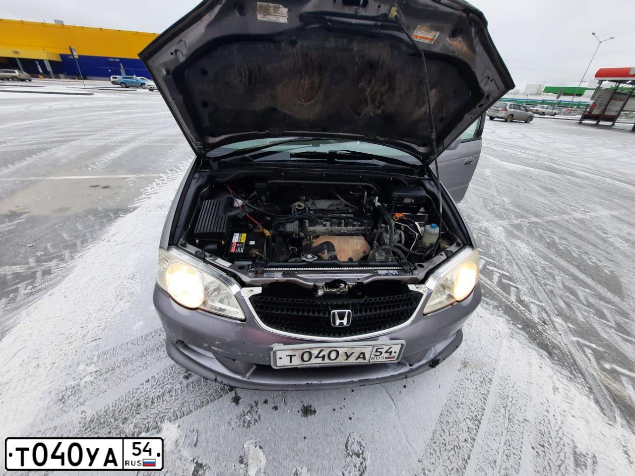 Фото автомобиля HONDA ODYSSEY, 2000 — госномер А416КК49