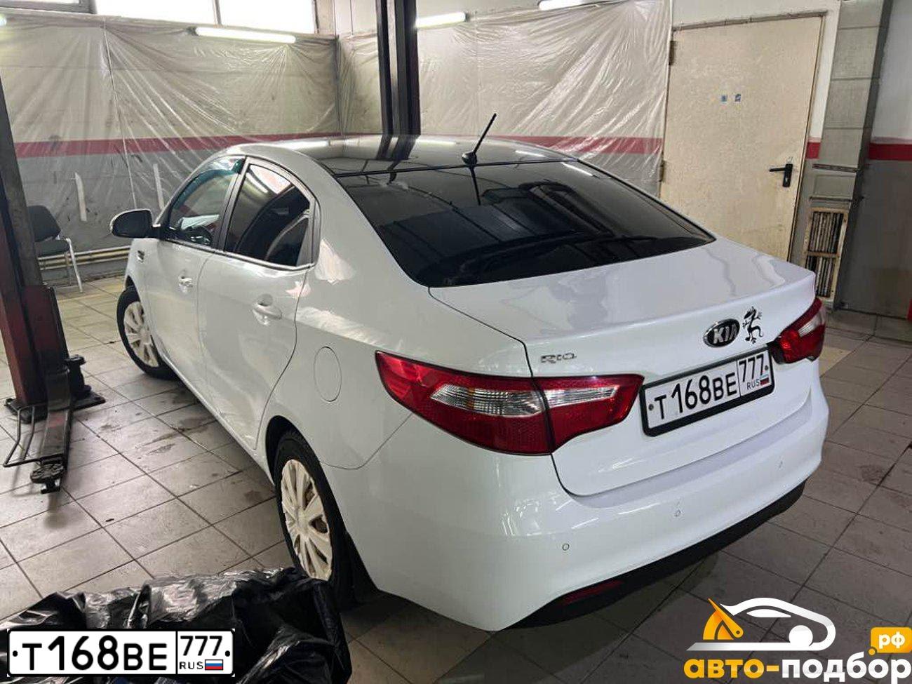 Фото автомобиля KIA RIO, 2014 — госномер С427КХ57. Цвет: Белый