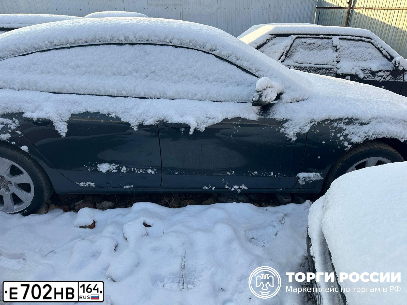Фото автомобиля AUDI A5, 2011 — госномер Е702НВ164. Цвет: ТЕМНО-СЕРЫЙ